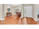 Welcoming foyer with hardwood floors, chandelier, and neutral color palette at 15075 Windsor Ln, Noblesville, IN 46060