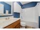 The bathroom features a shower-tub, wood-style vanity, and a large mirror above the sink at 16629 Greensboro Dr, Westfield, IN 46074