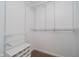 Walk-in closet with adjustable white metal shelving and dedicated spaces for shoe storage at 16629 Greensboro Dr, Westfield, IN 46074