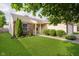 Charming home with lush green lawn, manicured bushes, and brick and siding accents at 16629 Greensboro Dr, Westfield, IN 46074