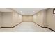 The finished basement features carpeted flooring, recessed lights, and neutral color, ready for customization at 182 Southwind Ln, Greenwood, IN 46142