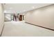 Bright basement with staircase and neutral walls, offering a flexible space for various uses at 182 Southwind Ln, Greenwood, IN 46142