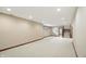 Finished basement with a staircase, recessed lighting and neutral color scheme, ready for personalization at 182 Southwind Ln, Greenwood, IN 46142