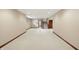 Spacious basement with staircase, recessed lighting, and baseboard trim offers a versatile living space at 182 Southwind Ln, Greenwood, IN 46142
