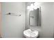 Half bathroom featuring pedestal sink and a mirror at 182 Southwind Ln, Greenwood, IN 46142