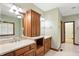 Bathroom showcasing double sinks with plentiful vanity storage, modern fixtures, and neutral finishes at 182 Southwind Ln, Greenwood, IN 46142