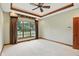 Bedroom with carpet floors, large window and a ceiling fan at 182 Southwind Ln, Greenwood, IN 46142