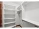 This walk-in closet has white shelving, and ample space for storage and organization at 182 Southwind Ln, Greenwood, IN 46142