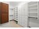 Walk in closet featuring custom shelving and storage at 182 Southwind Ln, Greenwood, IN 46142