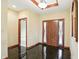 The entryway features high end doors and a black marble floor at 182 Southwind Ln, Greenwood, IN 46142