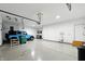 Spacious garage with a utility sink, overhead storage, and room for parking at 182 Southwind Ln, Greenwood, IN 46142