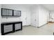Bright garage with storage cabinets and drawers on wheels at 182 Southwind Ln, Greenwood, IN 46142