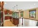 Spacious kitchen with an island, stainless steel appliances, and an adjoining dining area at 182 Southwind Ln, Greenwood, IN 46142