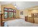 Bright living room with vaulted ceilings, a fireplace, and a large window with shutters at 182 Southwind Ln, Greenwood, IN 46142