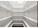Walk-in pantry providing lots of shelved storage at 182 Southwind Ln, Greenwood, IN 46142