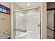 A pristine white shower stall with glass doors and chrome fixtures promises a refreshing experience at 182 Southwind Ln, Greenwood, IN 46142