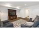 Finished basement with a comfortable seating area and entertainment center at 1905 N Alabama St, Indianapolis, IN 46202
