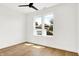 Bright bedroom with a ceiling fan and a view of the outside at 2015 Yandes St, Indianapolis, IN 46202
