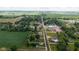 A beautiful aerial view of a parcel of land with approximate property lines outlined in white at 206 W Wall St, Advance, IN 46102