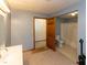 Bathroom with sink, toilet, and a shower/tub combo at 206 W Wall St, Advance, IN 46102