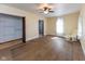 Bright bedroom featuring hardwood floors, closet, and natural light at 206 W Wall St, Advance, IN 46102