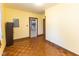 A naturally lit living room featuring hardwood floors and entryways into other rooms at 206 W Wall St, Advance, IN 46102