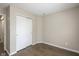 Bright and airy bedroom features a closet and stylish wood-look flooring at 2080 Bridlewood Dr, Franklin, IN 46131