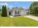 Charming single-story home with a well-manicured lawn and an attached two-car garage at 2080 Bridlewood Dr, Franklin, IN 46131