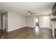 Open living area featuring wood-look flooring, neutral paint, and a ceiling fan at 2080 Bridlewood Dr, Franklin, IN 46131