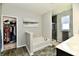 Bright bathroom showcasing a separate shower, garden tub, and closet at 21536 Gisborne Dr, Noblesville, IN 46062