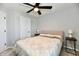 Comfortable bedroom features ceiling fan, neutral color palette and natural light at 21536 Gisborne Dr, Noblesville, IN 46062