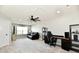 Spacious bonus room features a ceiling fan, comfortable seating, and versatile layout at 21536 Gisborne Dr, Noblesville, IN 46062