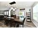 Bright dining area with sliding glass door and decorative shelving at 21536 Gisborne Dr, Noblesville, IN 46062