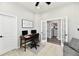Bright office space with neutral tones, a ceiling fan, and a decorative sign at 21536 Gisborne Dr, Noblesville, IN 46062