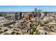 A high angle aerial view of the city with commercial buildings and residential areas at 225 N New Jersey St # 52, Indianapolis, IN 46204