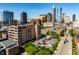 Aerial view showcasing the building and surrounding city skyline at 225 N New Jersey St # 52, Indianapolis, IN 46204