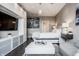 Spacious bedroom featuring a TV, modern cabinetry and a comfortable bed and sofa at 225 N New Jersey St # 52, Indianapolis, IN 46204