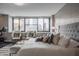 Elegant bedroom with a modern design, city views, and stylish decor at 225 N New Jersey St # 52, Indianapolis, IN 46204