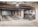 Garage with a ramp for easy vehicle access and storage for bicycles, offering convenient parking at 225 N New Jersey St # 52, Indianapolis, IN 46204