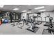 Community gym with various exercise machines, including treadmills, bikes, and weightlifting equipment at 225 N New Jersey St # 52, Indianapolis, IN 46204