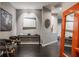 Inviting hallway with hardwood floors, console table and accent furniture at 225 N New Jersey St # 52, Indianapolis, IN 46204