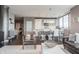 Inviting living space with open layout to dining area, modern finishes and hardwood floors at 225 N New Jersey St # 52, Indianapolis, IN 46204