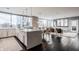 Bright living room featuring hardwood floors, modern furniture and city views at 225 N New Jersey St # 52, Indianapolis, IN 46204