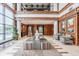 Grand lobby area with two-story windows, wood trim, tile flooring and neutral decor at 225 N New Jersey St # 52, Indianapolis, IN 46204