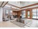 Inviting lobby area featuring seating, wood trim, tile flooring and neutral decor at 225 N New Jersey St # 52, Indianapolis, IN 46204