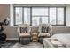 A lovely sitting area featuring comfortable chairs with a pillow with the word LOVE on it at 225 N New Jersey St # 52, Indianapolis, IN 46204