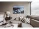 Cozy sitting area with picture window and comfortable sofa at 225 N New Jersey St # 52, Indianapolis, IN 46204