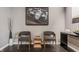 Comfortable waiting area featuring two chairs, stylish decor and hardwood floors at 225 N New Jersey St # 52, Indianapolis, IN 46204