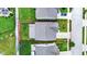 Aerial perspective showing the layout of a home's roof, yard, and surrounding neighborhood at 2282 Creekland Dr, Columbus, IN 47201