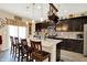 Stylish kitchen with a large center island, pendant lighting, and stainless steel appliances at 2282 Creekland Dr, Columbus, IN 47201